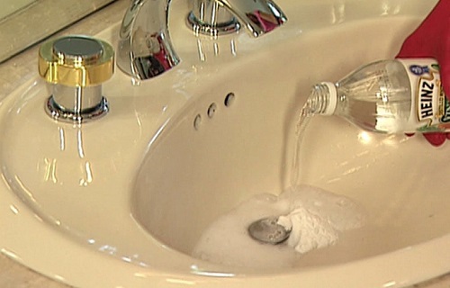 to clean bathroom sink drain